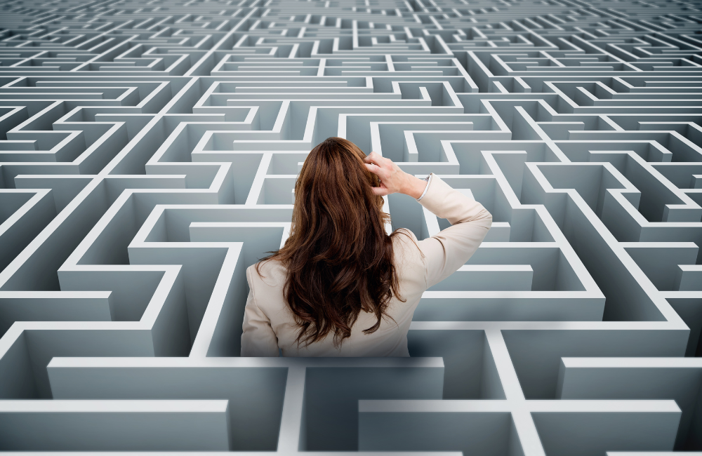 an image of a woman in a concrete maze suffering from decision fatigue.